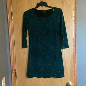 Form fitting green, sparkly dress